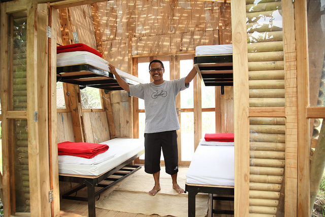 A Spedagi homestay bungalow, built entirely from locally available wood and bamboo, sleeps 4-5 people in bunk beds that fold up against the wall to create space during the day 7 dunn